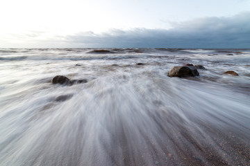 Storm large wave on the shore of the Baltic sea
