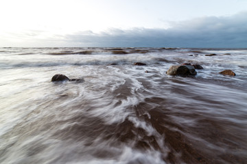 Storm large wave on the shore of the Baltic sea