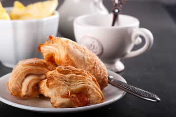 Homemade pastry with orange and Mugs of  Green Tea 