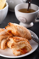 Homemade pastry with orange and Mugs of  Green Tea 