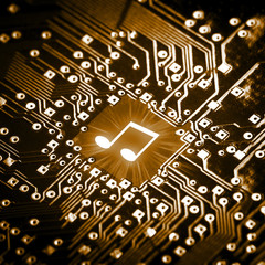 Music note on computer chip