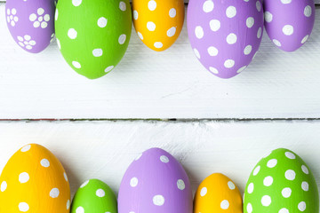 Easter eggs on wooden background