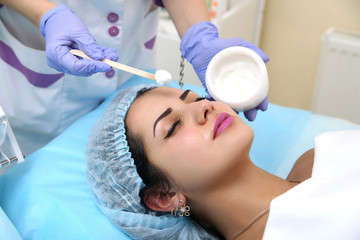 Applying a mask in the spa salon