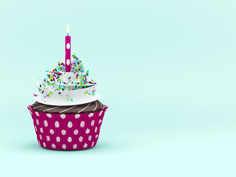  sweet cupcake with candleover light blue background