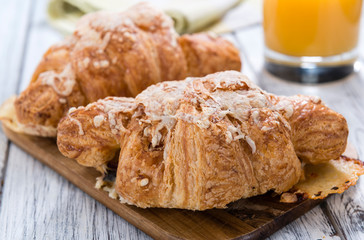 Ham and Cheese Croissant on an old wooden table