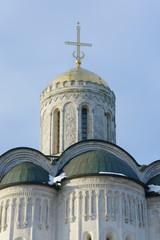 Fototapeta premium Very old orthodox church in Vladimir against the blue sky.