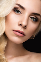 Obraz premium Beautiful blond woman with evening make-up, tender lips and curls. Beauty face.