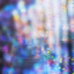 Abstract raindrop blur background in night blue tone