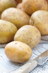 Raw unpeeled potatoes