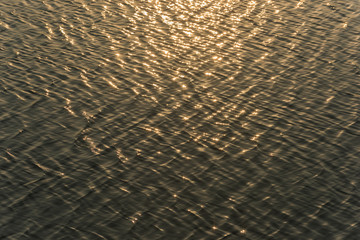 seamless texture warm color shining sunset water surface