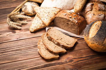 Bread assortment on wooden surface