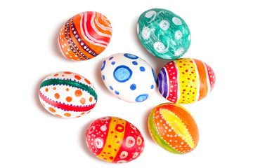 Easter eggs in beautiful and different colors on a white isolated background