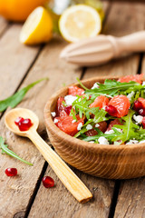 salad with grapefruit, arugula and cheese