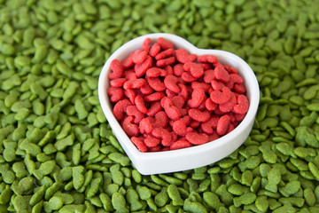 dry pet food red and green with heart shape cup , love pet concept