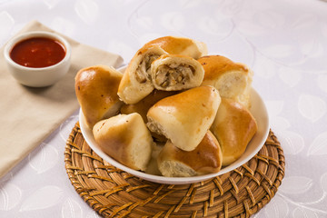 Brazilian snack. chicken Esfiha portion.