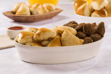 Mixed brazilian snack on the table.