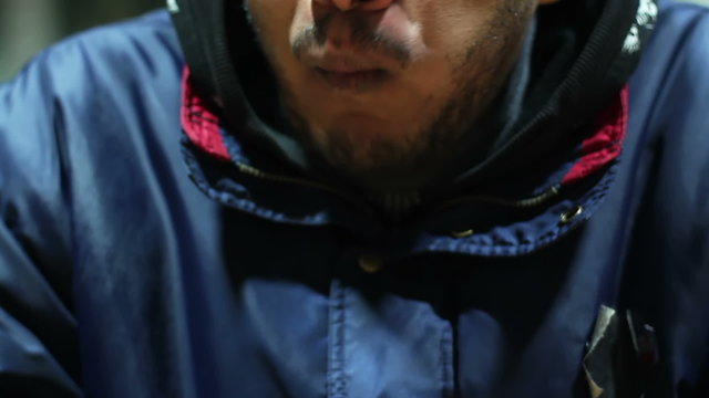 Male Worker Eating Unhealthy Fast Food Snack During Lunchtime, Gaining Weight