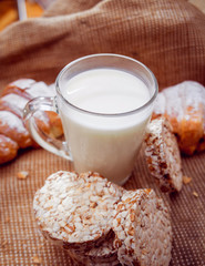 Beautiful breakfast. Milk, bread and croissant.