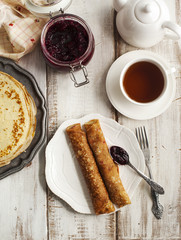 Crepes with black currant jam