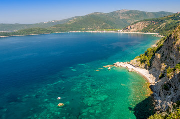 Fototapeta na wymiar Beautiful bay at Adriatic sea and small diving boat