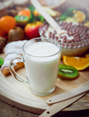 Beautiful breakfast. Milk,fruits, bread