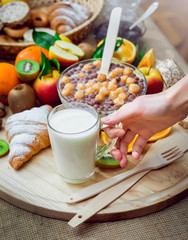 Beautiful breakfast. Milk,fruits, bread