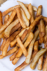 Close macro view of french fries on the plate