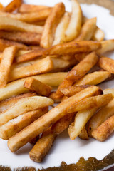 Close macro view of french fries on the plate