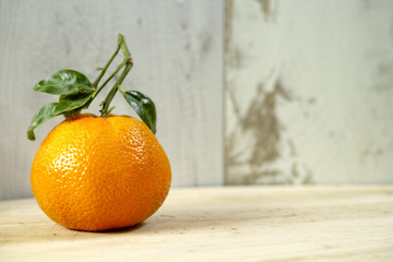Fresh mandarin oranges fruit with green leaves