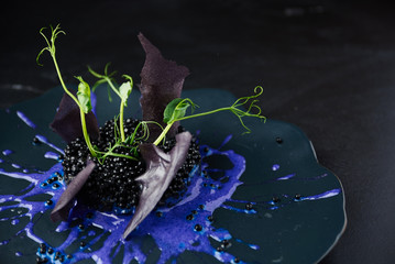 Risotto with cuttlefish ink and black caviar
