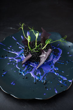 Risotto with cuttlefish ink and black caviar