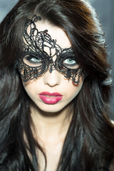 Woman in lace mask