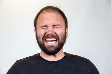 Fototapeta premium Man in Mid 30s Poses for Studio Portrait