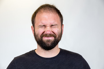 Fototapeta premium Man in Mid 30s Poses for Studio Portrait
