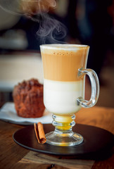 Hot coffee on the wooden table
