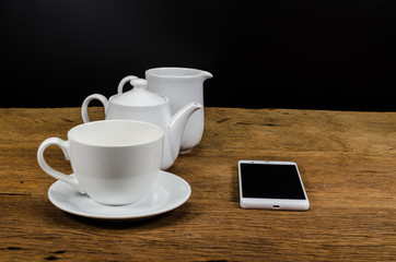 smart phone with coffee cup
