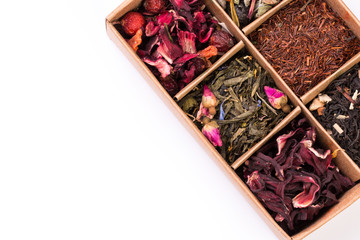 assortment of dry tea in a box, isolated on white
