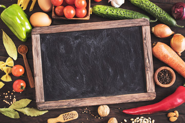Old blackboard and cooking ingredients