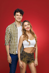 Portrait of young, smiling girl and a guy in a pin up style, iso