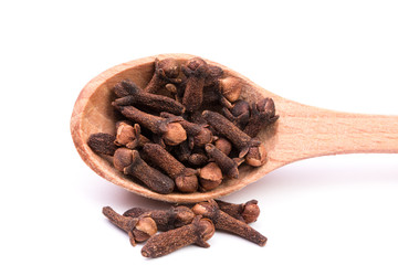 dry cloves on white background