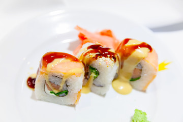 Sushi rolls with salmon, cucumber and rice, macro