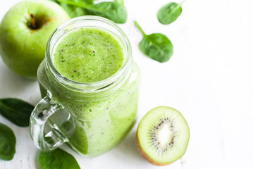 Healthy green smoothie in jar.