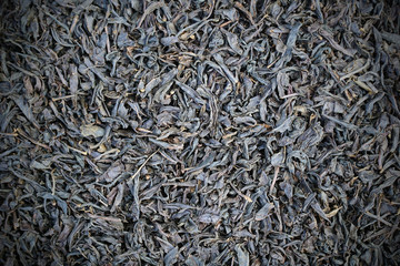 tea granules texture background close up