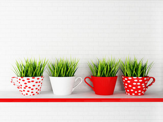 cups with the grass on the shelf,