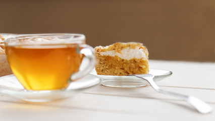 Piece of pie with lemon-orange filling and meringue