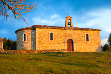Fototapeta premium Hermitage near Santo Domingo de Silos town at sunset, province of Soria, Spain