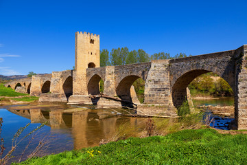 Medieval stone bridge over Ebro river in Frias, historic village in the province of Burgos, Spain