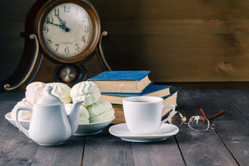 Book, sweets and tea