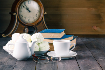Book, sweets and tea