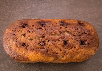  cake with jam on light brown background 